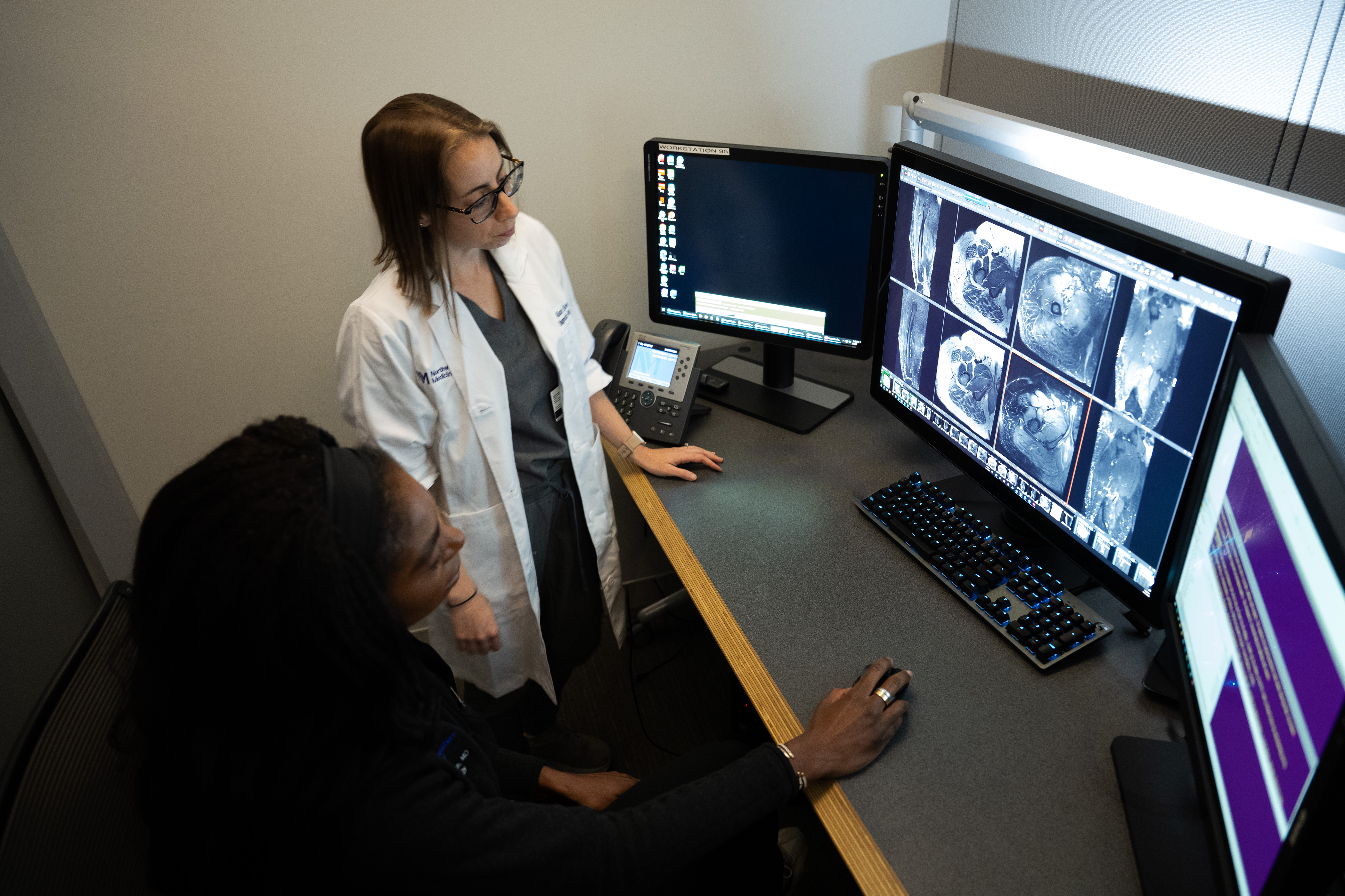 Faculty Reviews an Xray with a Resident